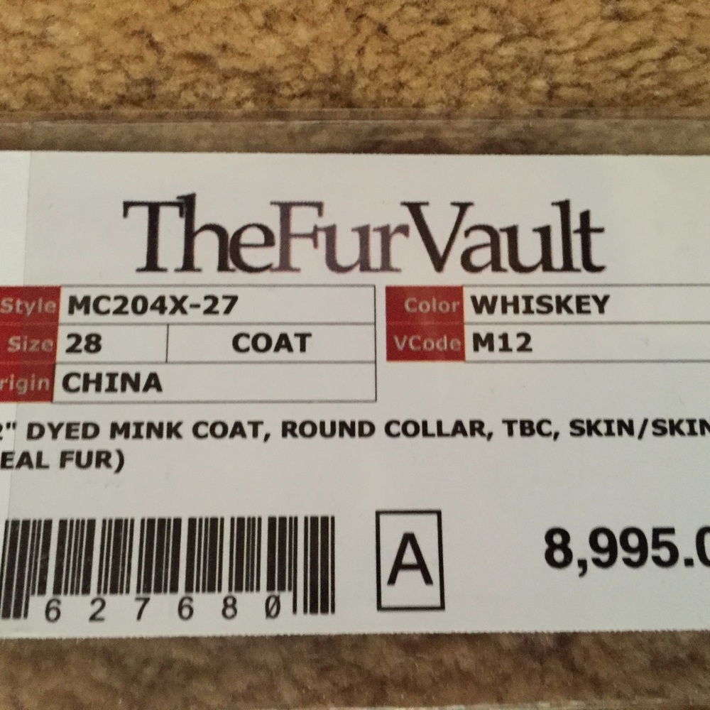 Size 28, 32 inch Dyed Mink, Whiskey color, Round collar and cuffed sleeves.